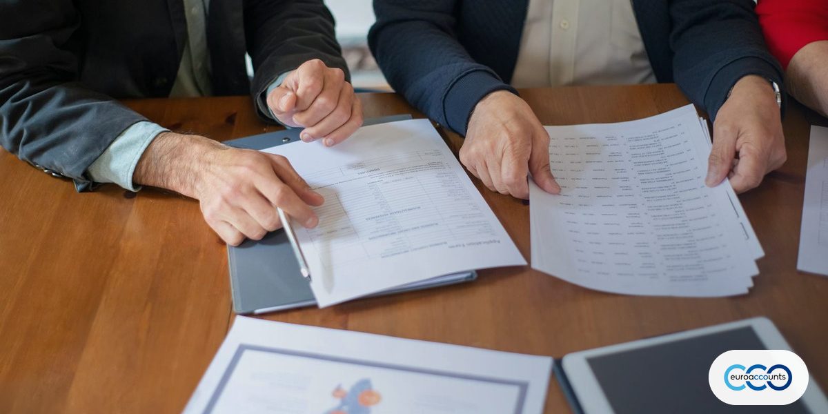 Reviewing tax documents in a meeting