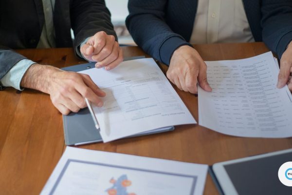 Reviewing tax documents in a meeting