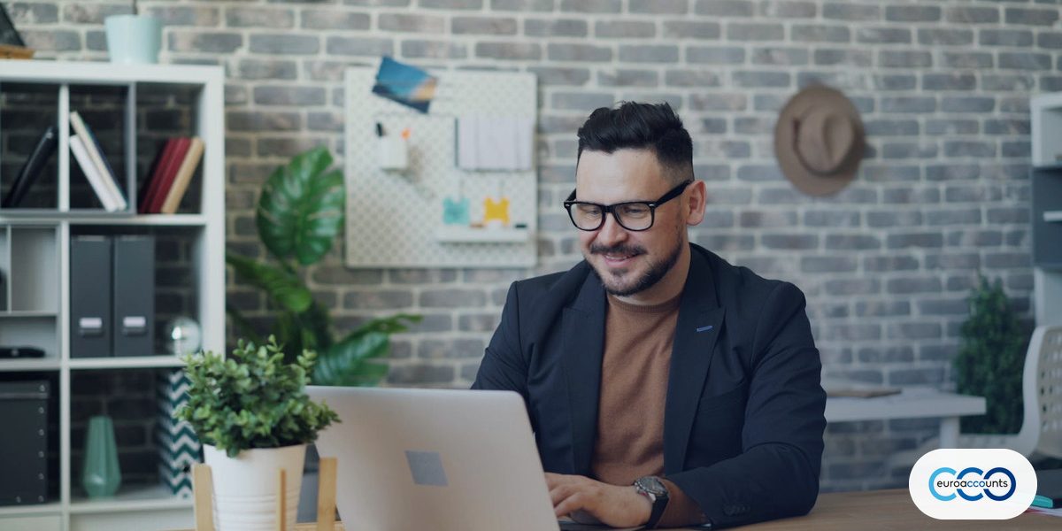 Professional working remotely on a laptop