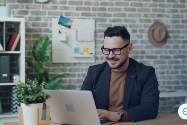 Professional working remotely on a laptop